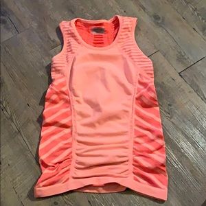 Athleta work out tank with ruching  at the bottom